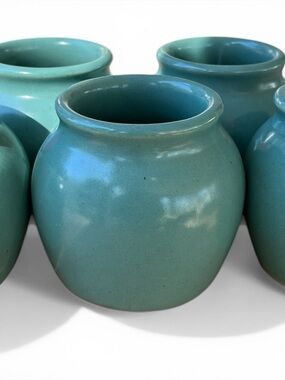 Stoneware 5 small crocks great for chili or soup. Marked Made in USA